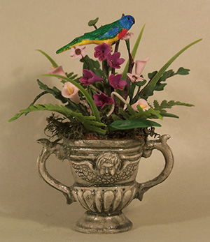 Orchids in green Urn with Bird